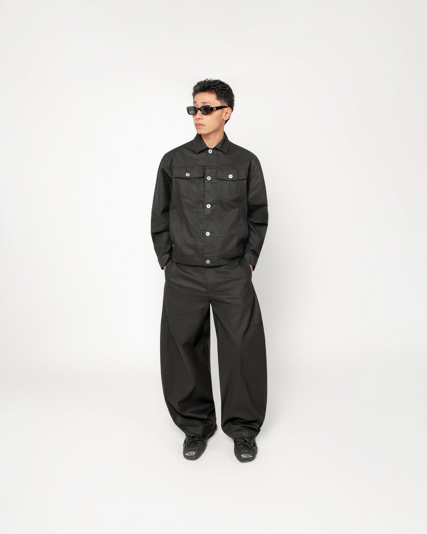SIDES OF US BLACK OILED CURVED PANTS
