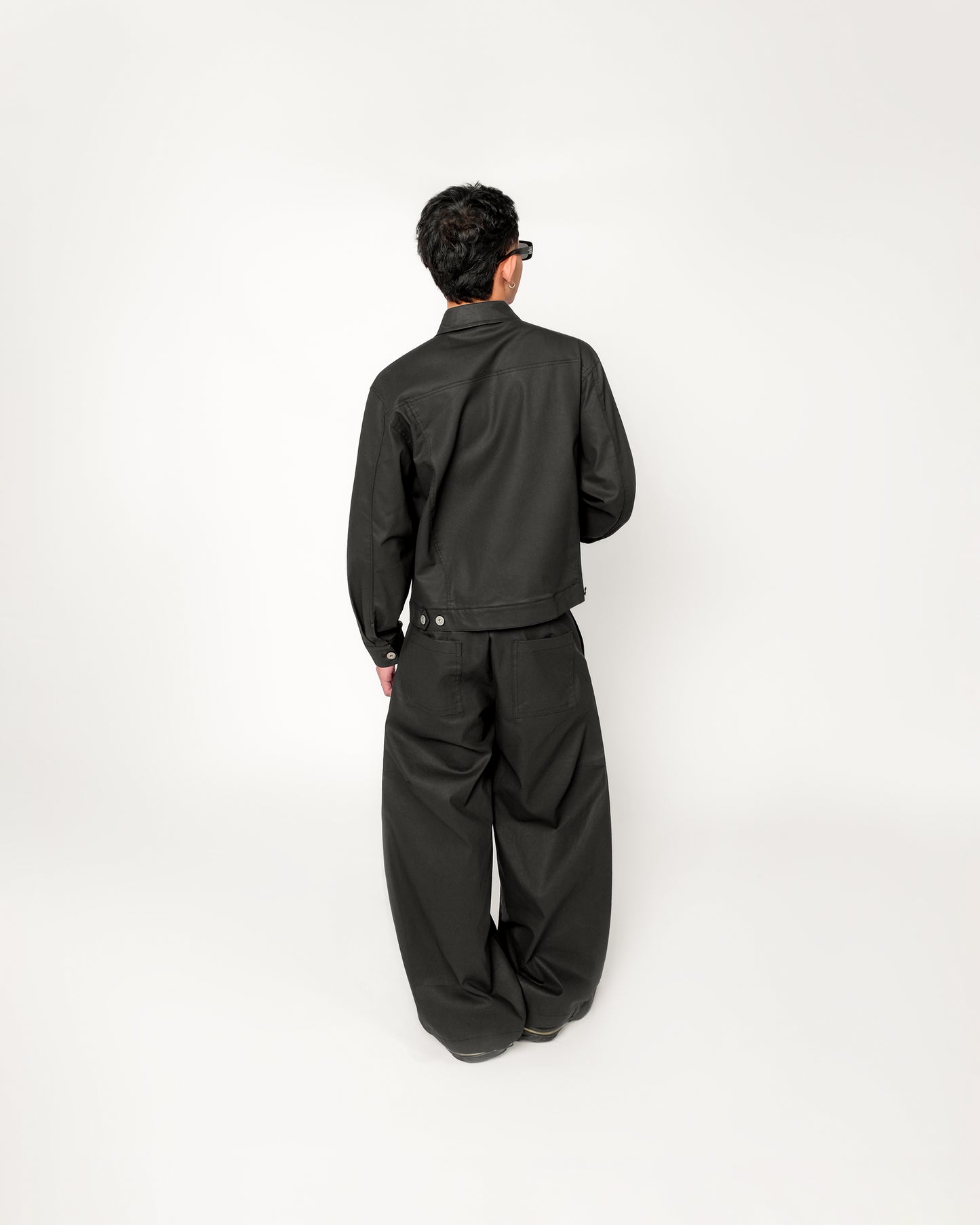 SIDES OF US BLACK OILED CURVED PANTS